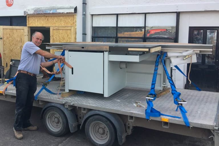 The Big Saw is Delivered on A Trailer